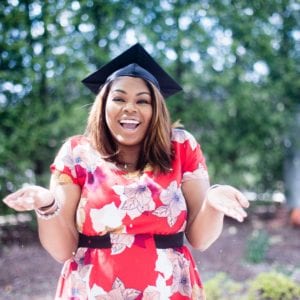 African American woman in graduation cap